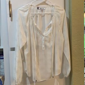 Jennifer Lopez, md, white and silver blouse